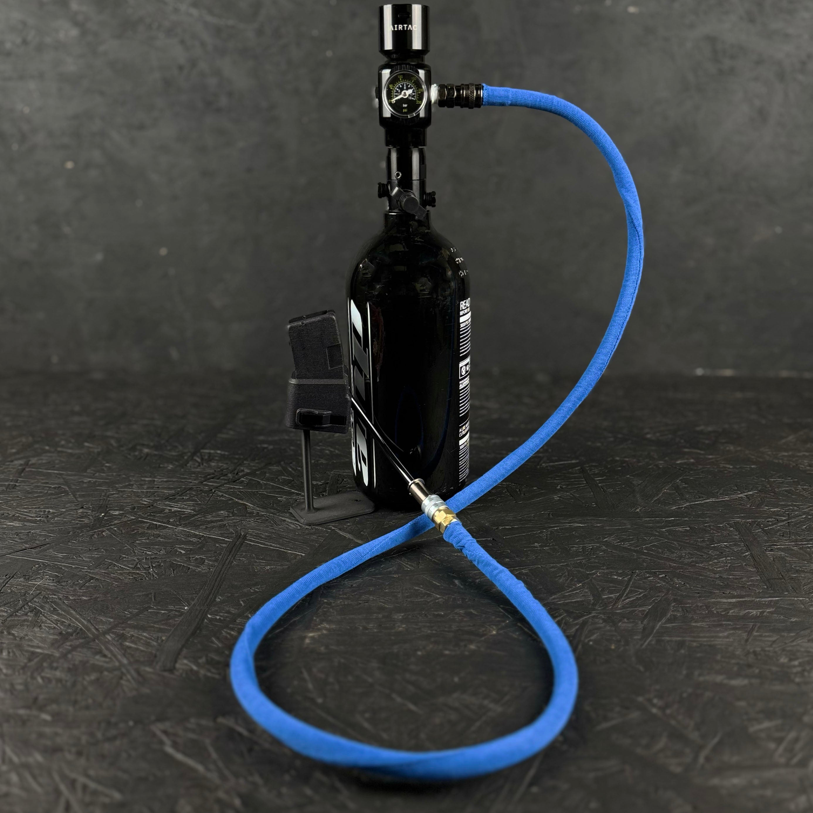 Photo of blue Airtac Line Cover attached to adapter and reg