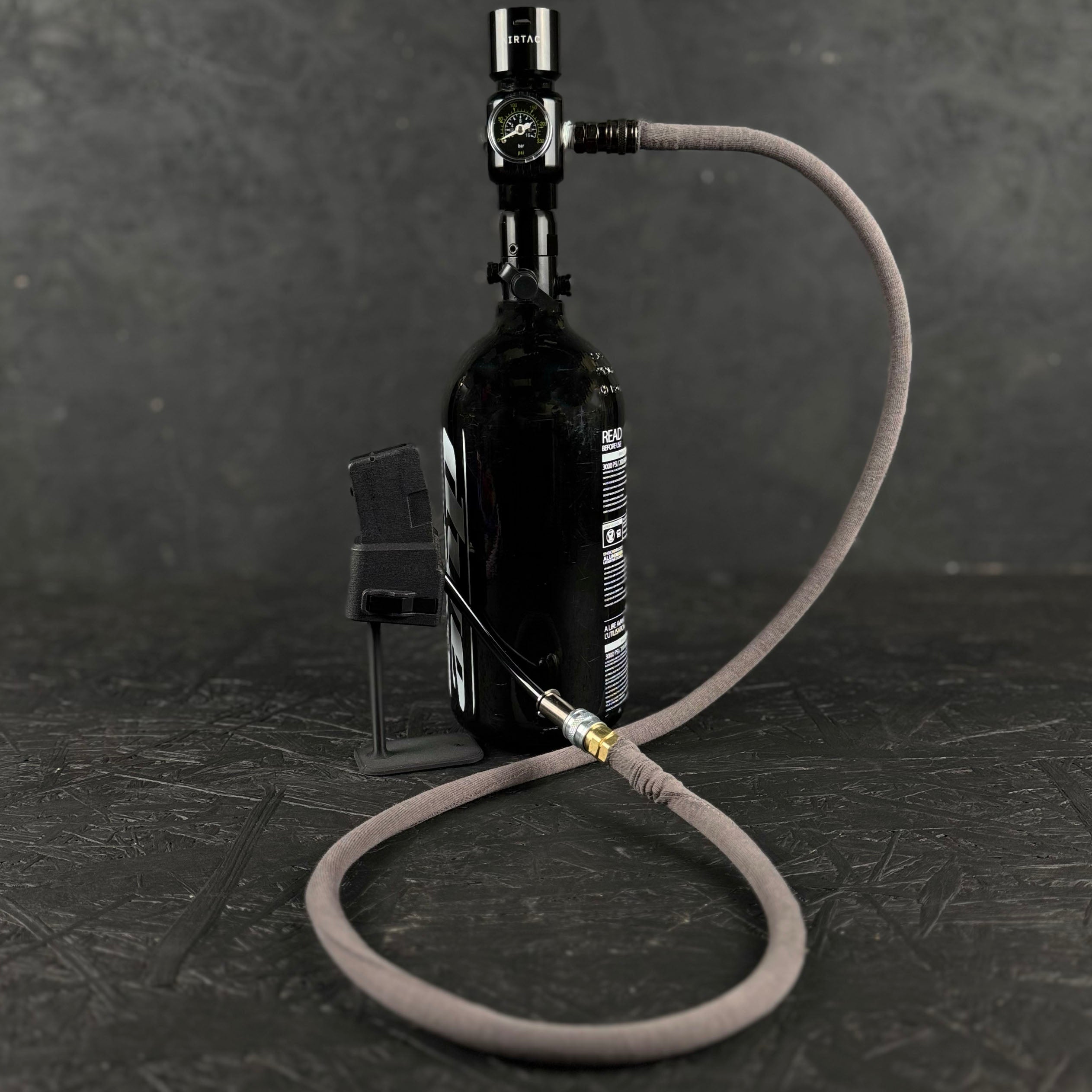 Photo of grey Airtac Line Cover attached to adapter and reg