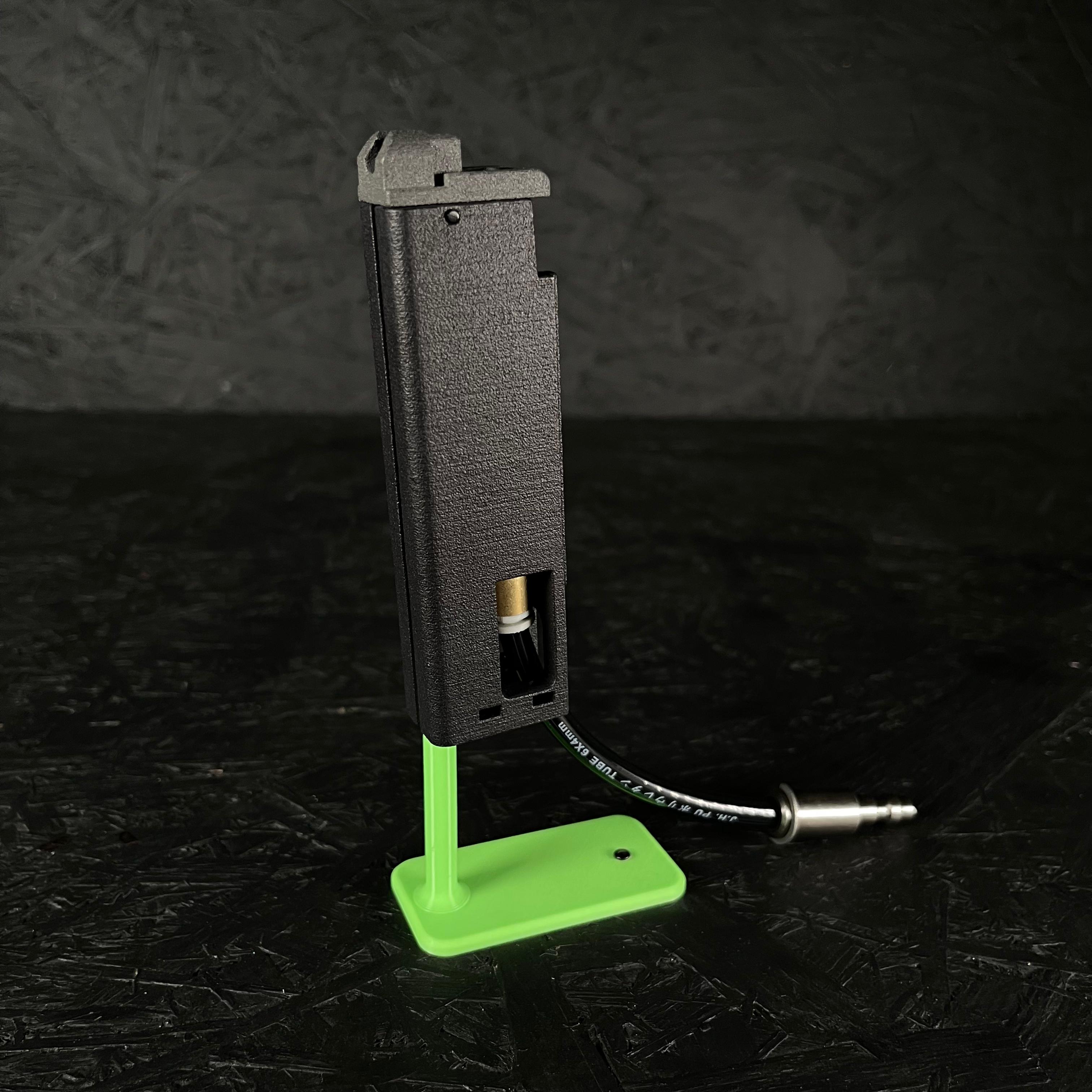 Photo of AIRTAC KWA/ASG MAC11 HPA Adapter Modular Base on a green stand