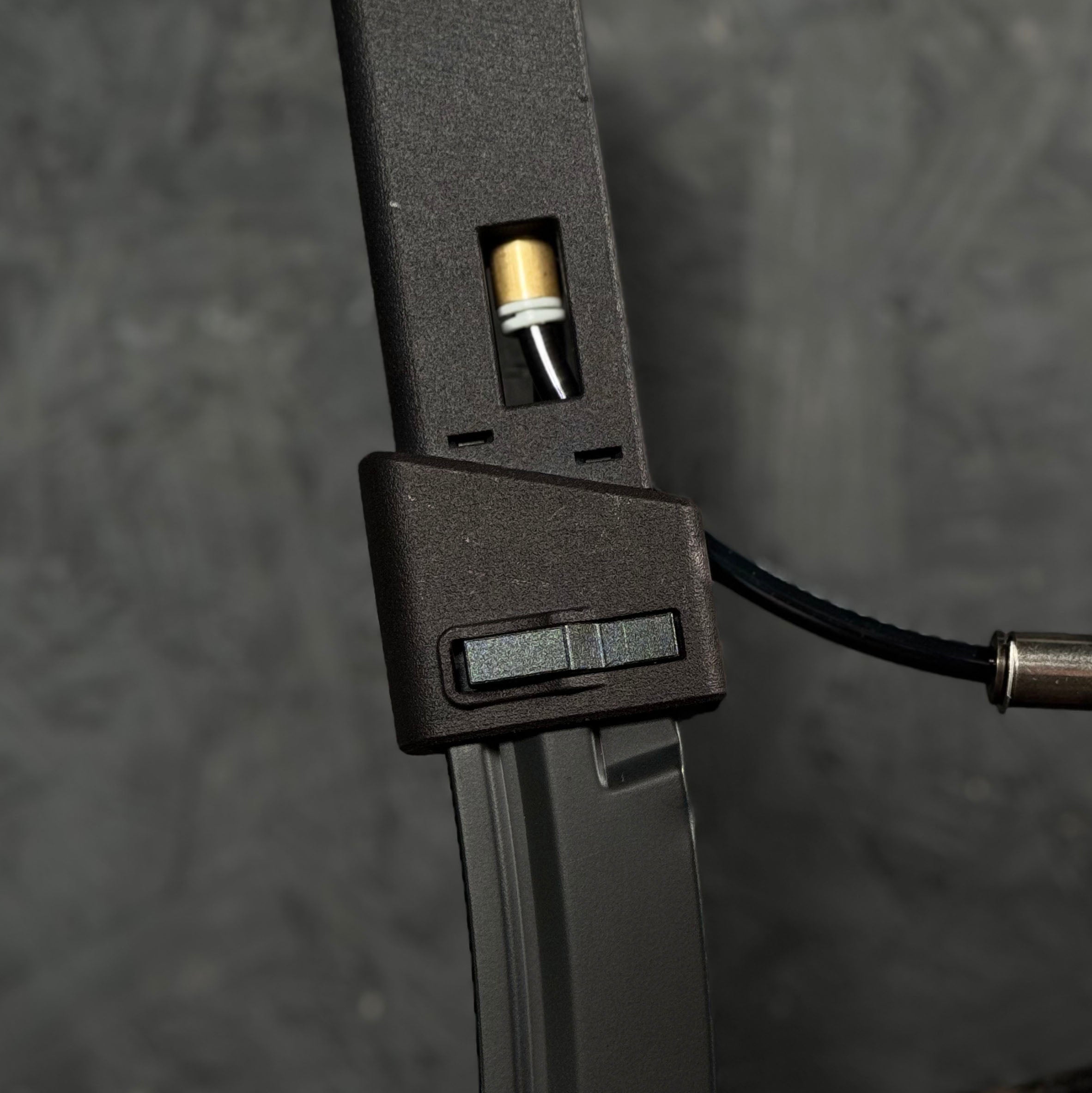 Close up photo of AIRTAC KWA Kriss Vector HPA Adapter with MP5 magwell and magazine