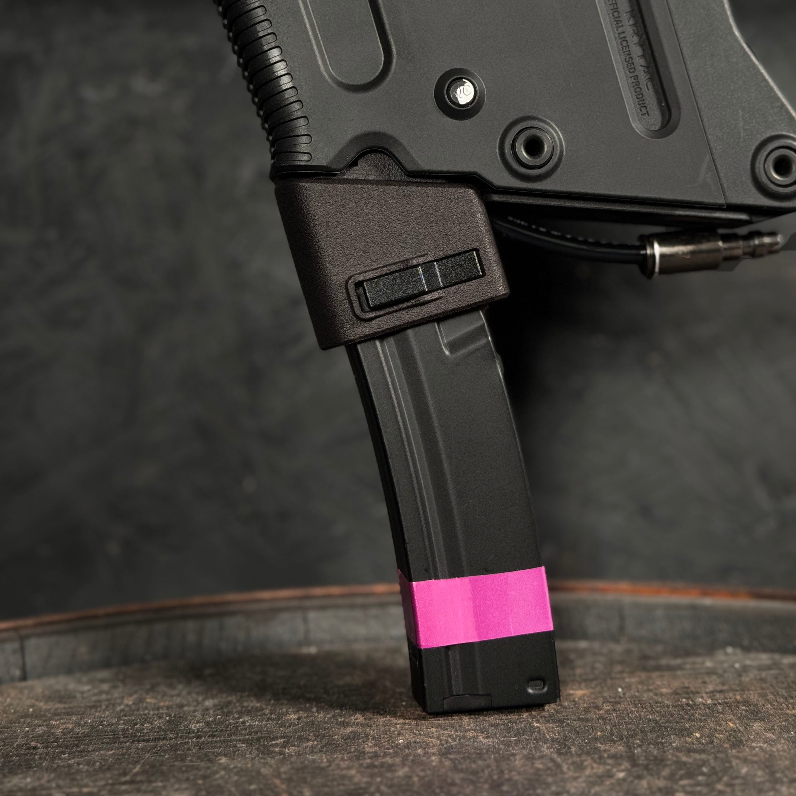 Close up photo of AIRTAC KWA Kriss Vector HPA Adapter with MP5 magwell and magazine in RIF
