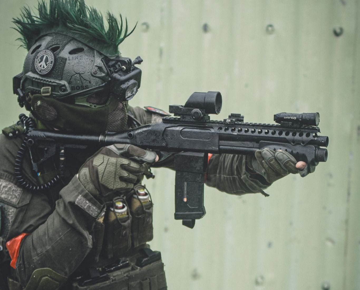 Photo of AIRTAC Shotgun to M4 Adapter (TM-M870/Breacher/Golden Eagle/Secutor) in RIF. RIF is being held by an individual green and black clothing and gloves.