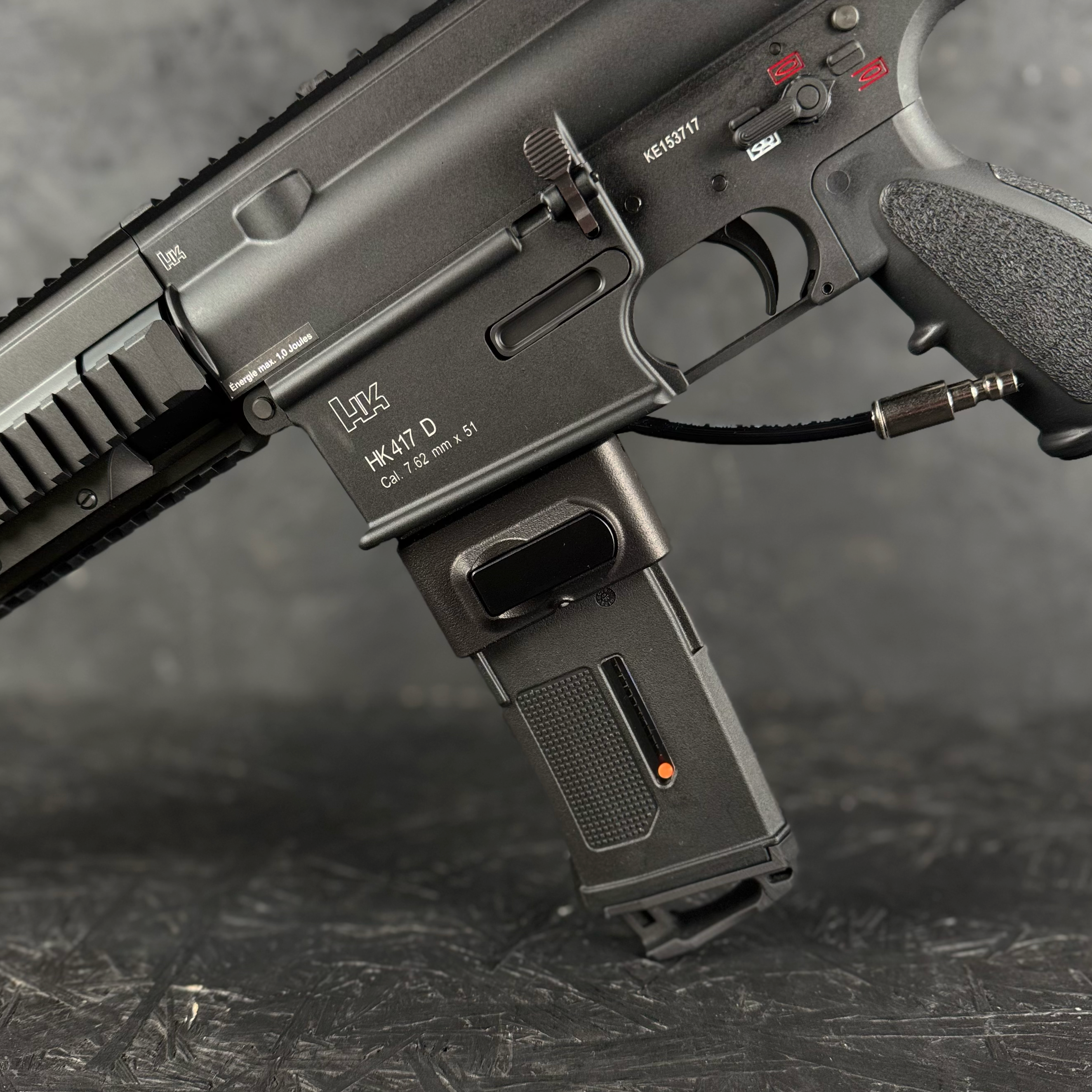 Close up photo of AIRTAC VFC 417 HPA Adapter with M4 magwell and magazine in RIF.