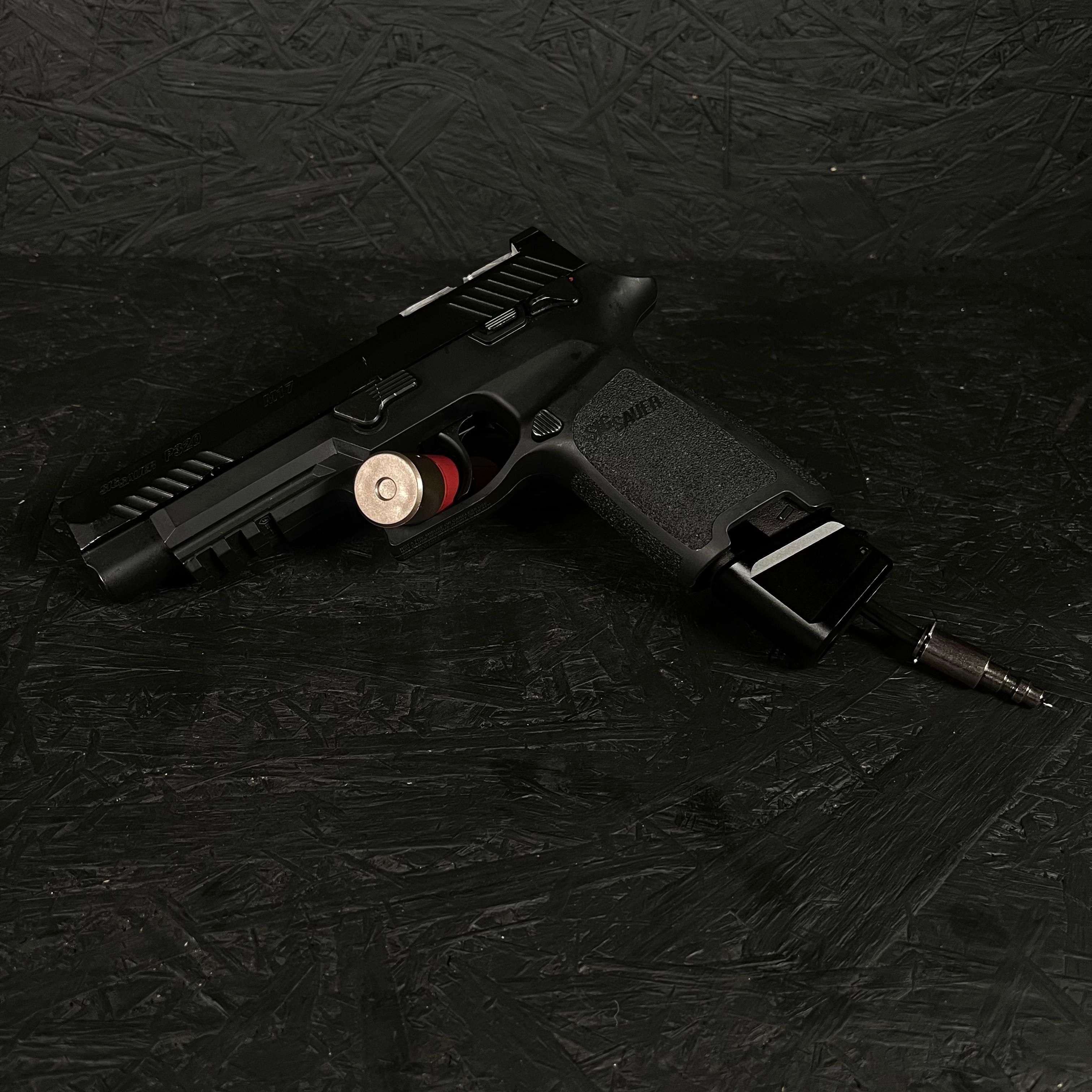 Photo of AIRTAC VFC/SIG M17/M18/XCARRY Shotgun Shell HPA Adapter in a black RIF with black CNC base