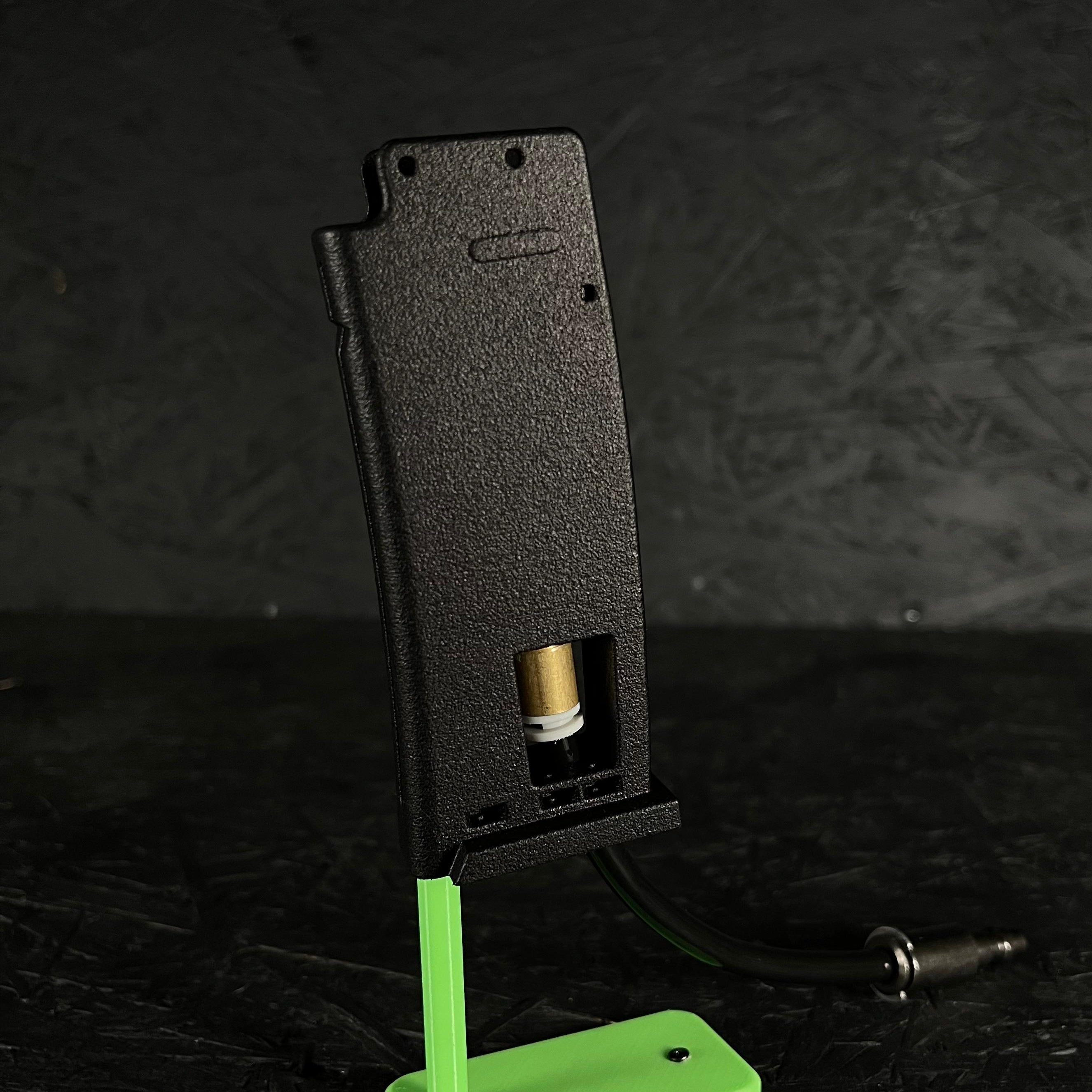 Photo of AIRTAC Tokyo Marui MP7 HPA Adapter Modular Base - PLUG AND PLAY on a green stand