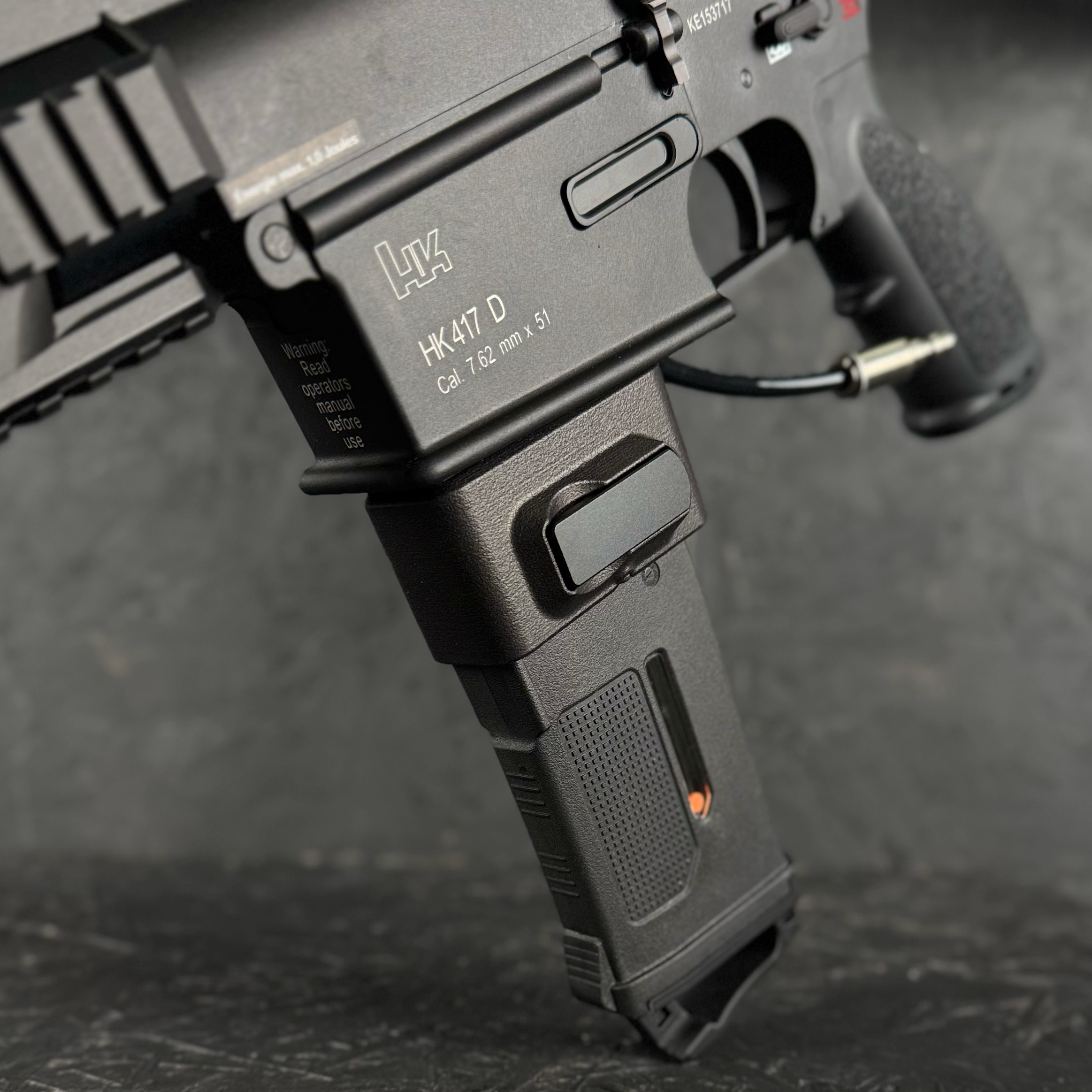 Close up photo of AIRTAC VFC 417 HPA Adapter with M4 magwell and magazine in RIF.