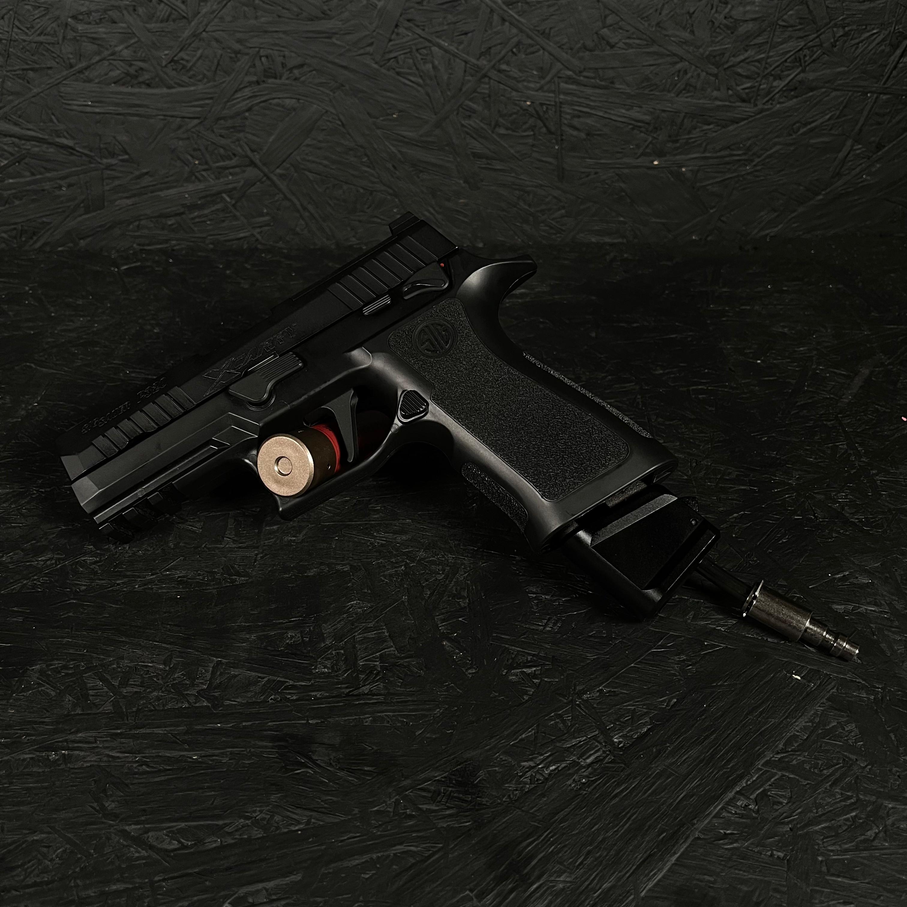 Cropped photo of AIRTAC VFC/SIG M17/M18/XCARRY Shotgun Shell HPA Adapter in a black RIF